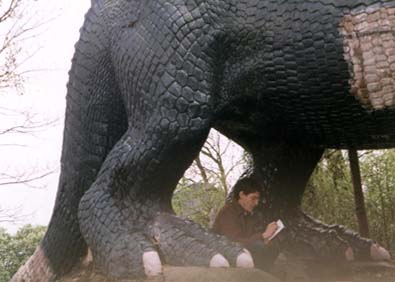 Brian Selznick drawing undeneath an Iguanodon